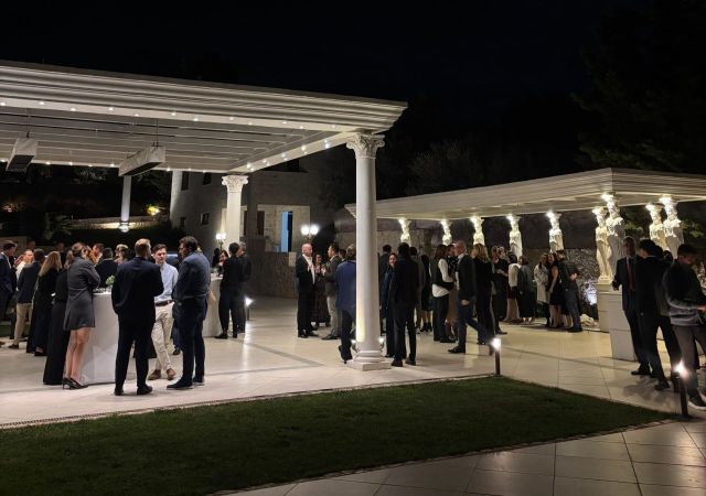 photo of outside crowded room with people